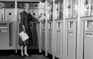 Grace Hopper (1959) with a COBOL manual